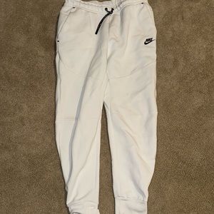 White Nike tech pants